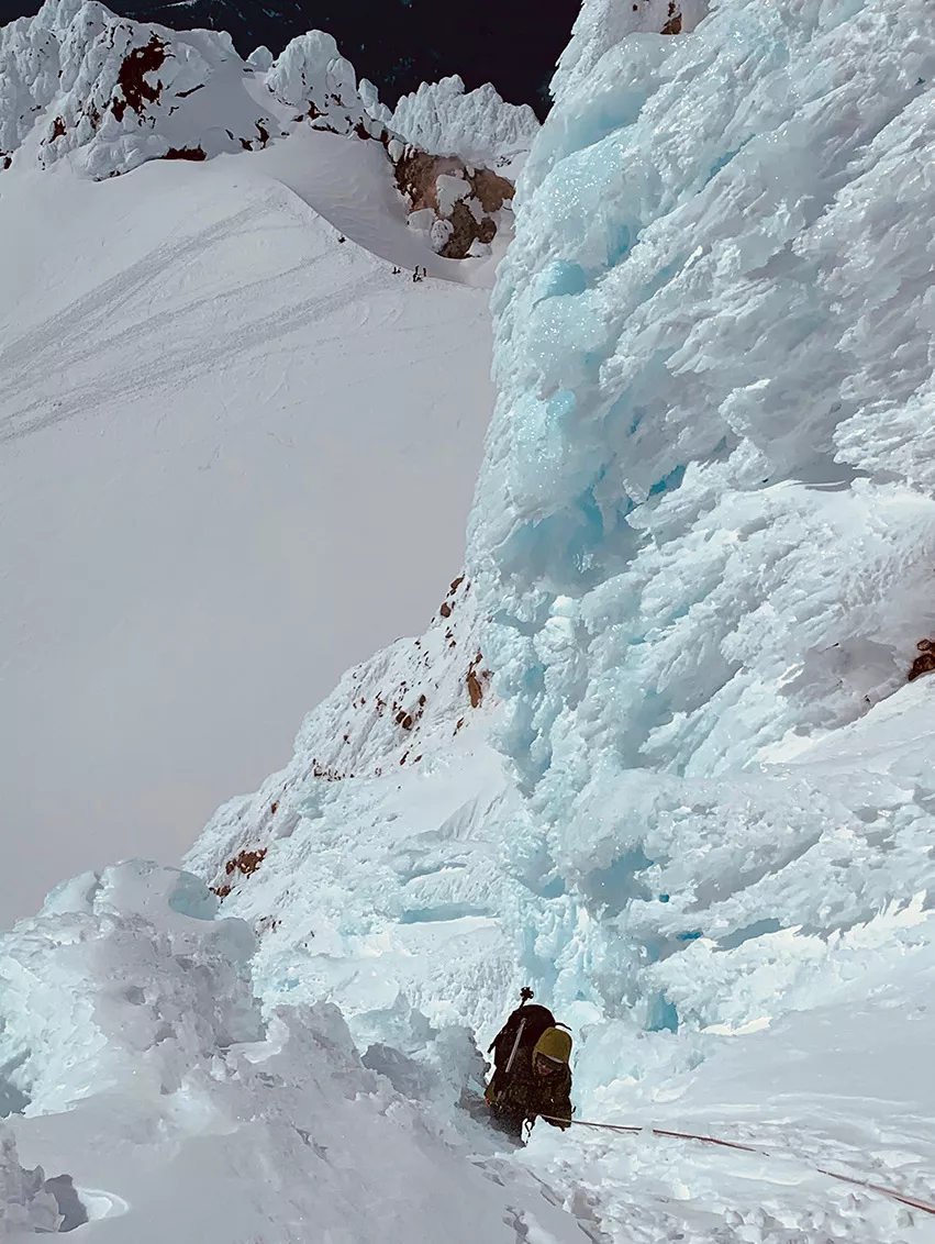 A group climbing the final section of the Devil's Kitchen on Mt. Hood.