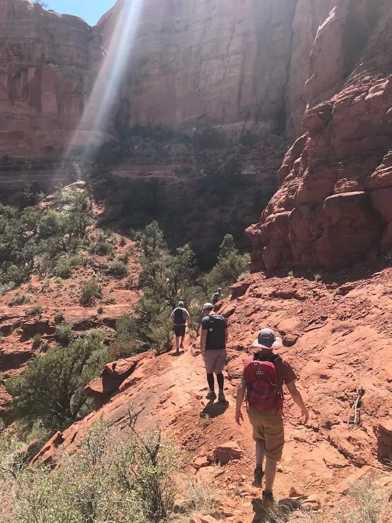 Hikers on Templeton trail at Cathedral Rock in Arizona.